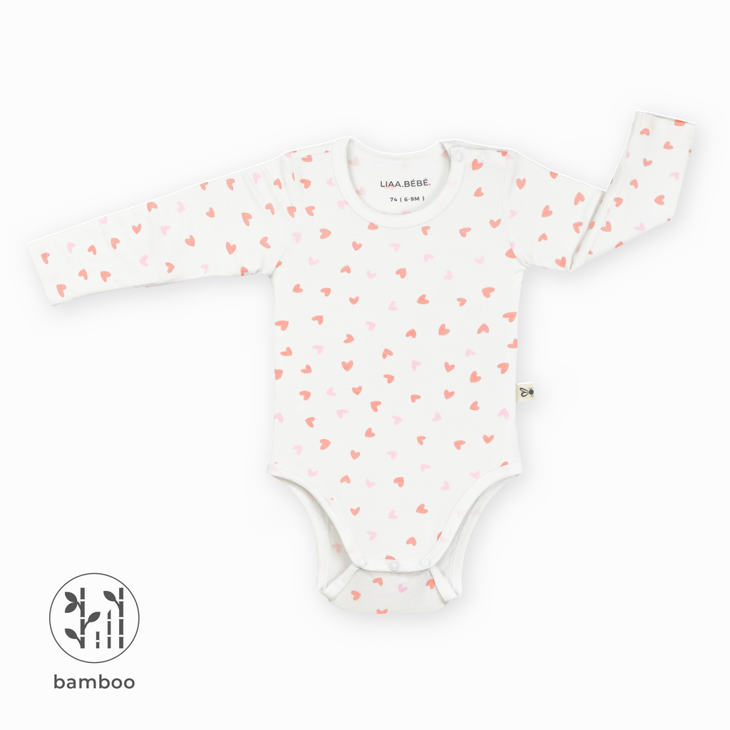 LiaaBébé Baby Bodysuit with pink hearts.