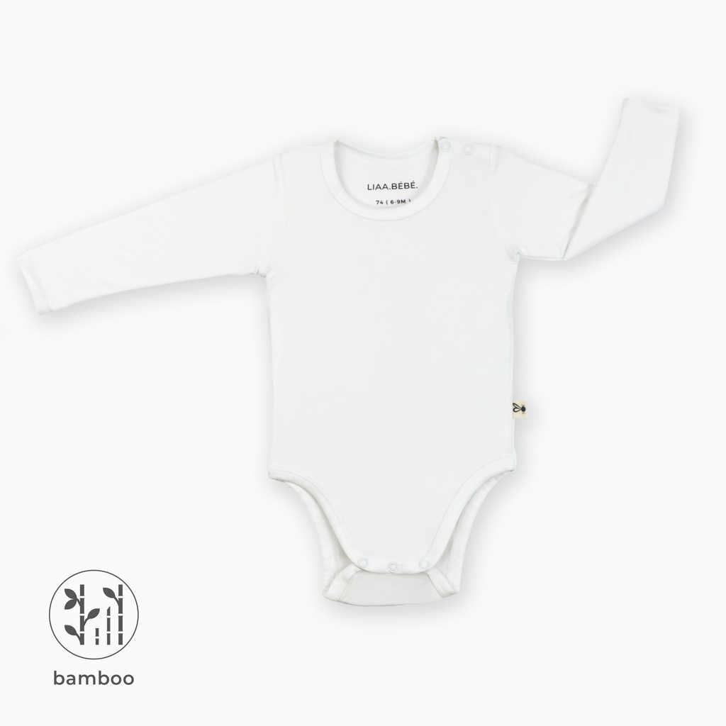 White LiaaBébé Long Sleeve Bodysuit.